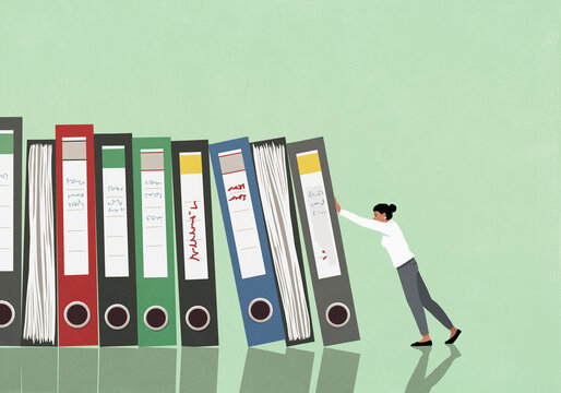 Businesswoman pushing file binders against green background, domino effect