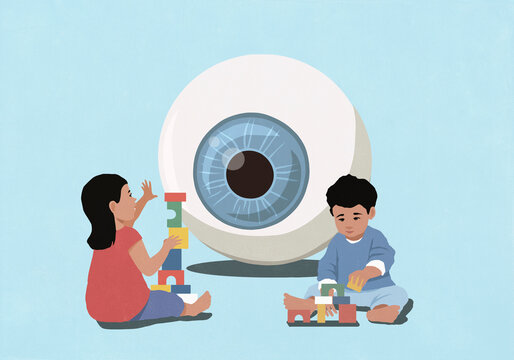 Large eyeball watching toddlers playing