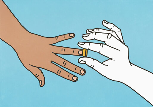 Close up of hand placing wedding band on partner's finger