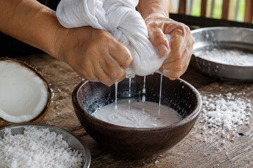 Fototapeta premium Photorealistic Coconut Milk Preparation With Local Cultural Authenticity