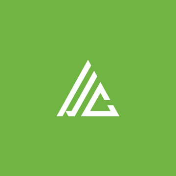 Modern abstract F C logo design template with a triangle concept, white triangle logo on green background