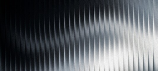 Abstract textured background with vertical lines and a gradient from dark to light, creating a modern and dynamic pattern © Rahman