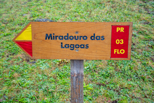 Pedestrian trail direction sign to the Lagoa viewpoint. Ilha das Flores, Azores, Portugal.