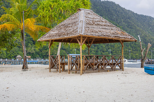 The beach scene with gazebo on the beach under palm tree