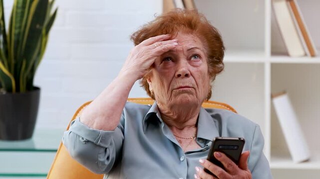 Elderly woman struggling to use her smartphone, expression of confusion, frustrated elderly user needs help with technology, generation gap, modern communication difficulties