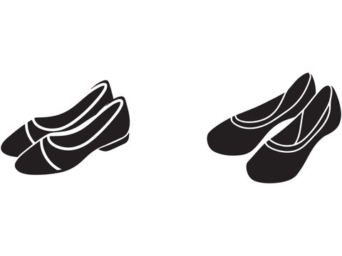 pairs of black ballet flats with white outlines side by side on white background