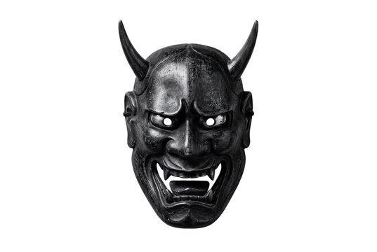 Japanese Hannya demon noh mask, dark charcoal black oni face, horns bared teeth hollow eyes, traditional theater prop cultural artifact