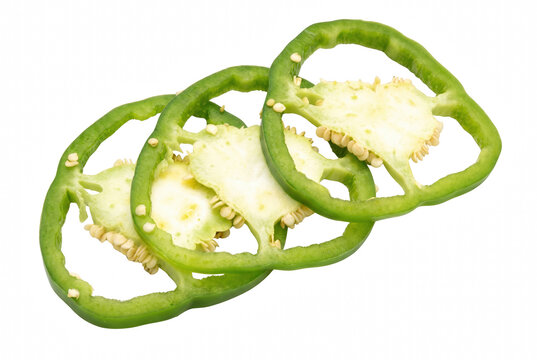 Three Fresh Slices of Green Bell Pepper with Visible Seeds