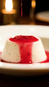 Cinematic View Of Vanilla Panna Cotta With Raspberry Coulis Dripping Down The Side And Vanilla Bean Specks
