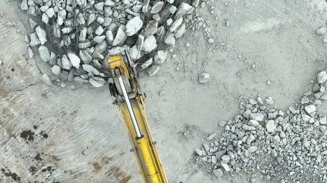 A reinforced concrete pavement demolition with exposed steel reinforcement, reflecting infrastructure replacement, engineering progress, disaster resilience, and future-ready urban development. 4k.
