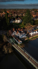 Naklejka premium Victorian Suspension Footbridge and Tudor House on River Severn, Shrewsbury