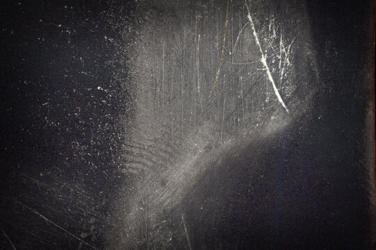 Blank grained film strip texture background with heavy grain, dust and light leak