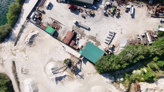 Aerial zenithal view of a gravel pit industrial plant