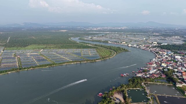 Aerial drone view of fishing boats at Sungai Udang jetty
