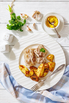 Cold meat aspic plate with crispy potatoes