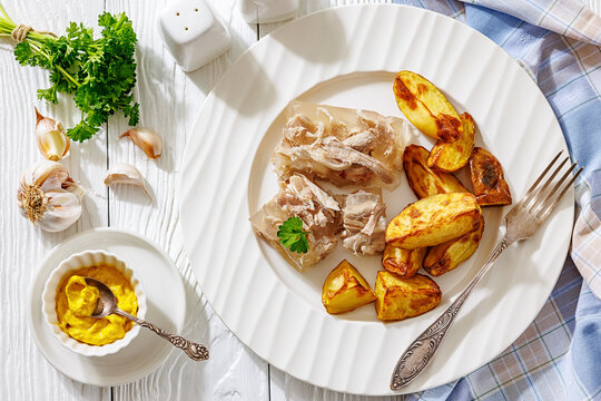 Cold meat aspic plate with crispy potatoes