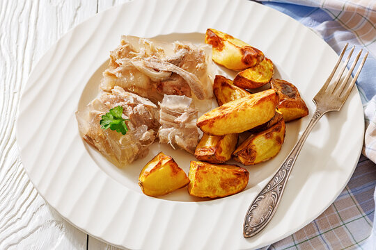 Cold meat aspic plate with crispy potatoes