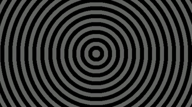 Hypnotic concentric circles pattern in black and gray creating a dizzying optical illusion.