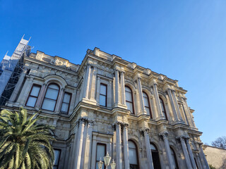 Historic ornate building facade with blue sky © Studio-M