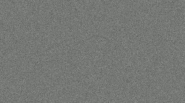 A textured, grainy, grey background with a subtle, uniform pattern, perfect for design elements.