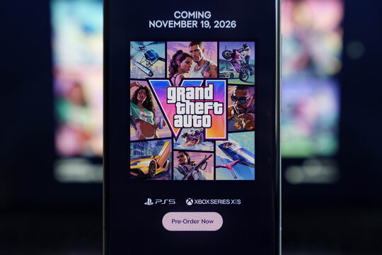 Screen displaying a pre-order announcement for Grand Theft Auto VI with its official logo art grid and platforms, video game release and gaming industry asset