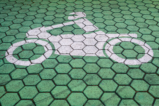 White Motorcycle Parking Symbol Painted On Pavement