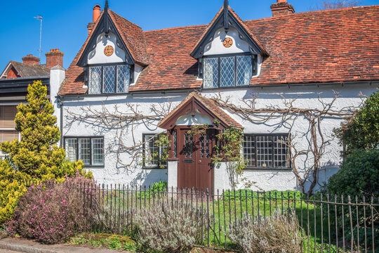 A generic countryside cottage with white exterior in the village Shere, Guildford district of Surrey, UK