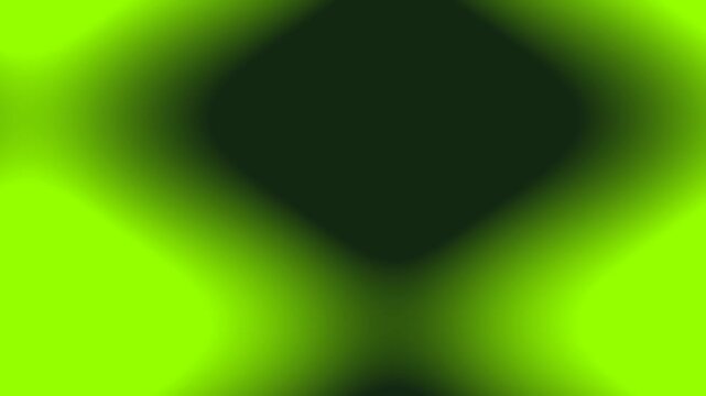 Abstract green and black gradient diamond shapes with soft focus and bokeh effect.