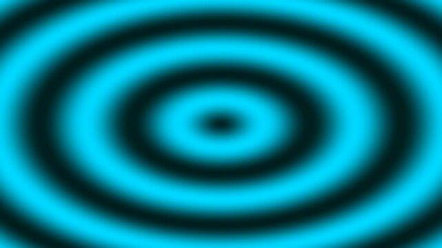 Abstract blue concentric circles with a blurred gradient effect, representing waves or sound.