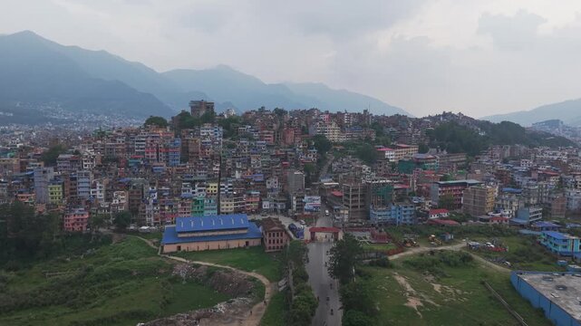 Aerial view of Kirtipur, Nepal, highlighting ancient Newari architecture, historic temples, and the traditional urban landscape from above.