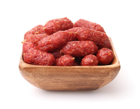 Smoked  mini sausages in wooden bowl