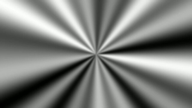 Abstract radial brushed metal background with a starburst effect and metallic sheen.