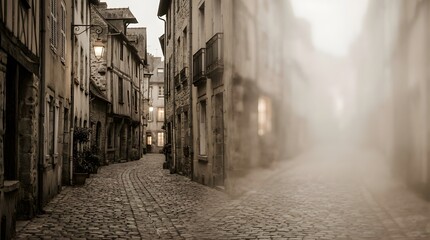 Fototapeta premium Sepia toned narrow medieval alleyway in France fading into thick fog