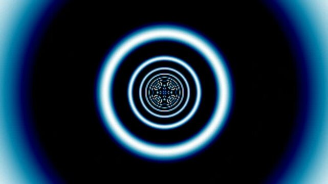 Abstract glowing blue circles and patterns receding into darkness, creating a sense of depth and mystery.