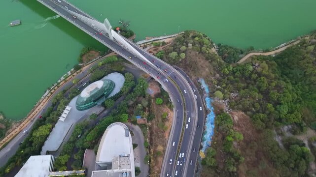 Aerial shot of traffic at Durgam Cheruvu Bridge at Hyderabad, India