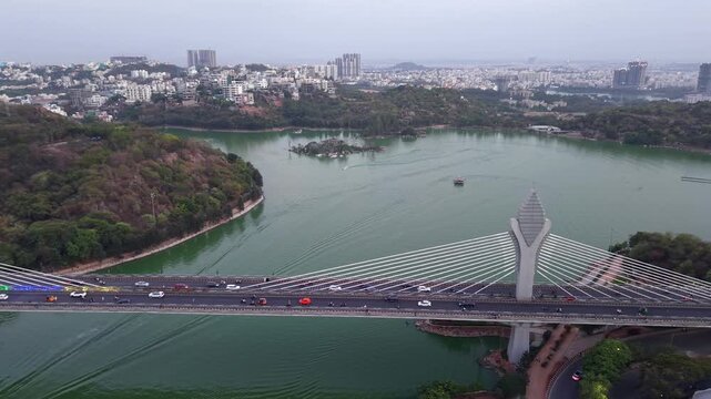 Aerial shot of traffic at Durgam Cheruvu Bridge at Hyderabad, India