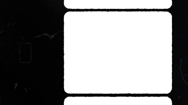 Vintage super 8 mm motion picture film strip frame suitable for moviethemed designs, backgrounds, posters, and retro media projects. Old movie aesthetic.