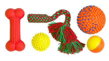 Dog toys red bone rope spiky balls, and bicolor ball © Lubos