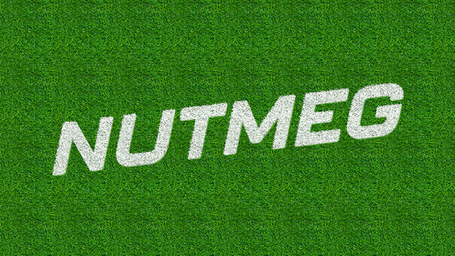 White text spelling out a spice name rests on a vivid green grassy field.