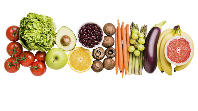 Assorted fresh fruits and vegetables arranged in a line