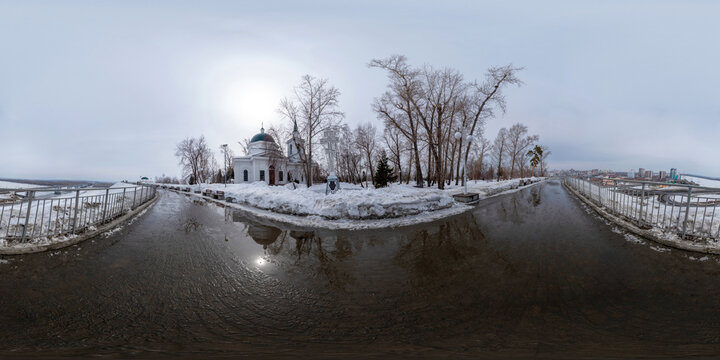 March 22 2026 Barnaul Russia Nagorny Park panorama with Orthodox church of St John the Baptist overlooking Ob River and city snowy winter scenic view