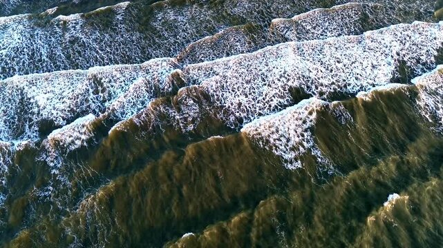 Aerial Close View of Ocean Waves and White Surf Patterns on Tropical Ecuador Coastline, Dark Water Texture and Natural Seascape Background