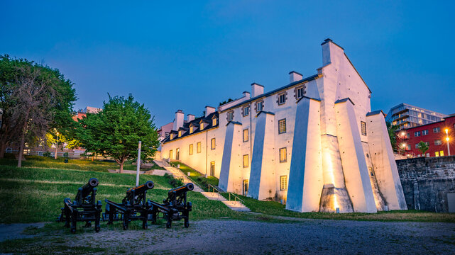 One of the oldest military buildings in Quebec, the Dauphine redoubt at dusk with canons on the side, part of the National Historic Site in Old Quebec