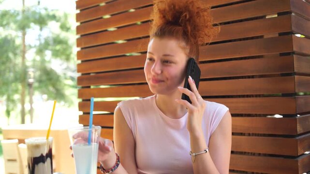 young woman talking on the phone