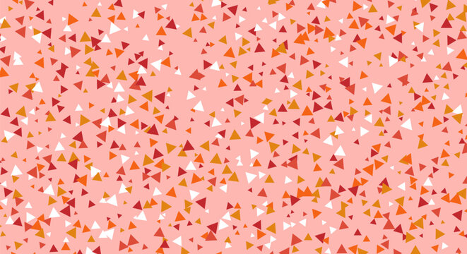 Abstract red and orange triangle confetti pattern on pink background.