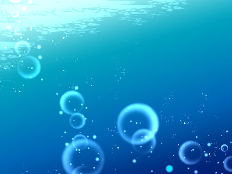 水中から見上げる海面と泡