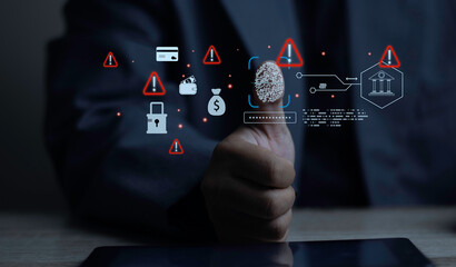 Businessman scanning thumbprint with virtual biometric fraud and bank hack warning icons on tablet. Concept of identity theft, financial cyber attack, and mobile security risk. © sarach