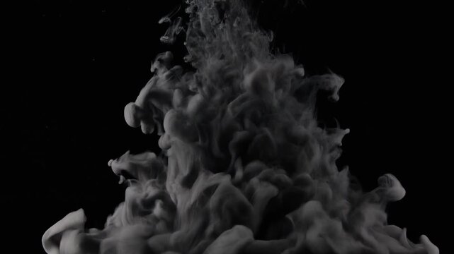 Abstract Black Ink Cloud Swirling in Water on Dark Background