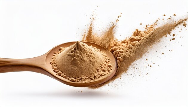 wooden spoon with powder splashing isolated on white background wooden spoon with maca powder spilling onto surface isolated on white background