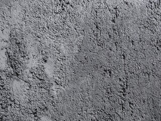Obraz premium Minimalist monochrome grunge concrete wall texture with rough cement surface and industrial gray abstract background
